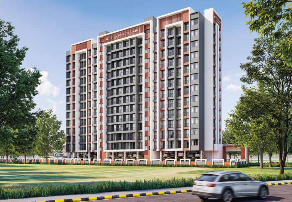 Street-level front view of Shivshakti Oasis high-rise residential building with modern architecture in Badlapur