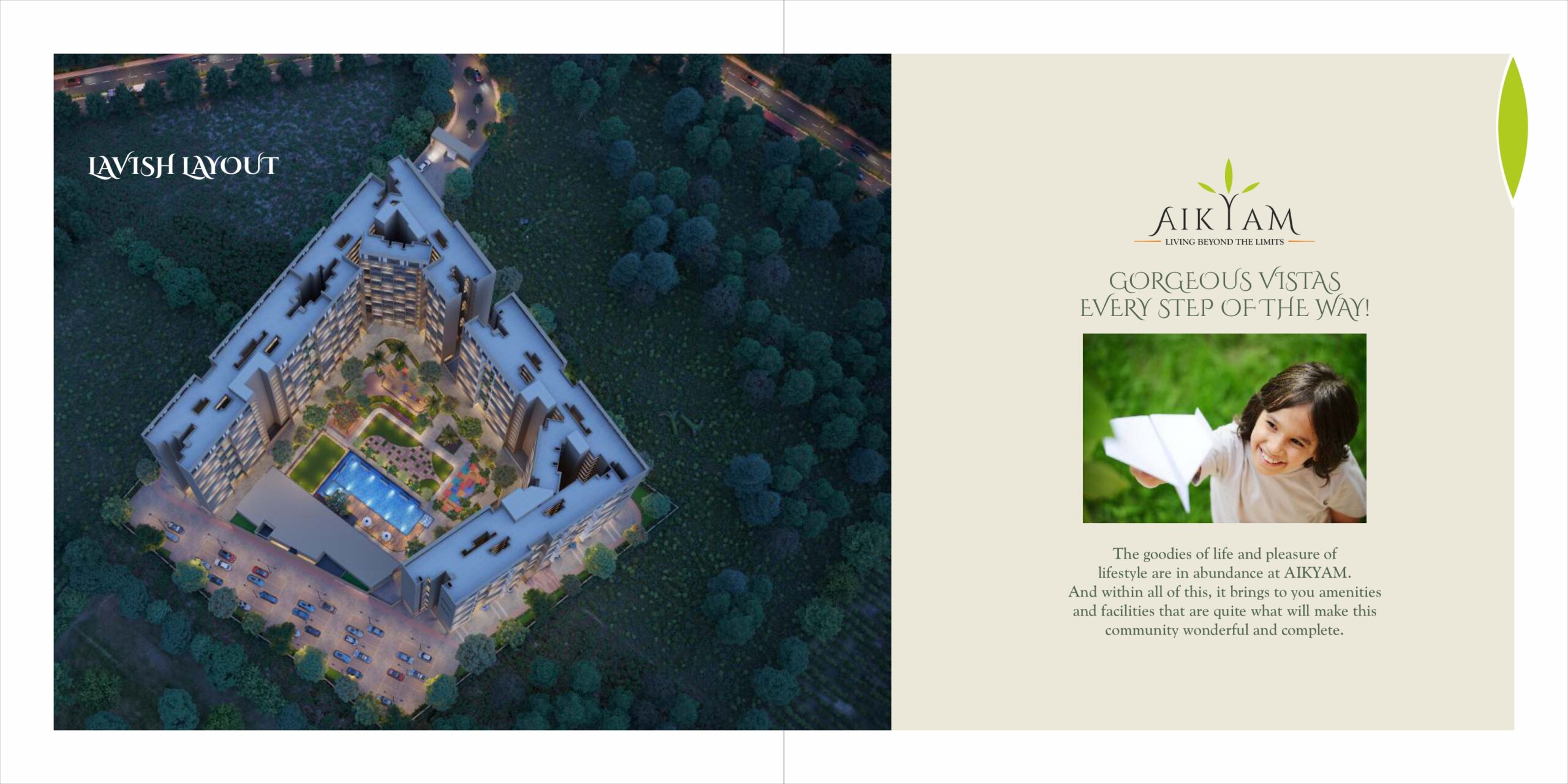 Top-down view of Aikyam residential complex layout showing landscaped gardens, swimming pool, and spacious building arrangement surrounded by greenery.